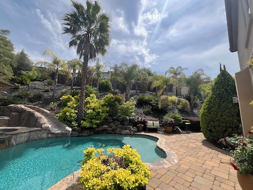 Resort style 4 bedroom home in Hillcrest gated community with pool and spa