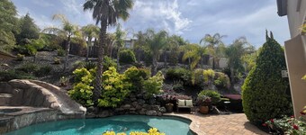 Resort style 4 bedroom home in Hillcrest gated community with pool and spa