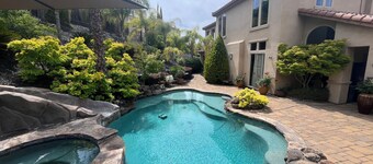 Resort style 4 bedroom home in Hillcrest gated community with pool and spa
