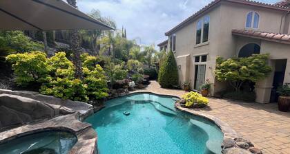 Resort style 4 bedroom home in Hillcrest gated community with pool and spa
