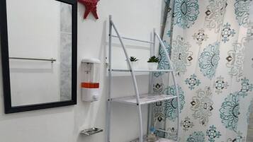 Shower, towels, soap, toilet paper