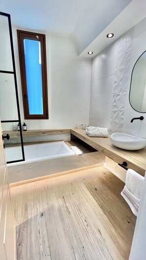 Shower, jetted tub, hair dryer, bidet