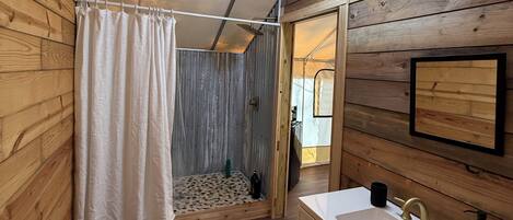 Shower, towels, soap, toilet paper
