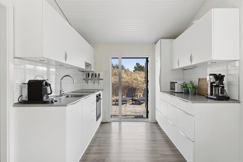 Spacious holiday home 150 m from the beach