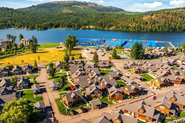 A residential area with houses, a dock, and a lake. - Waterfront Dover Bay House: Walk to Marina & (Dover)