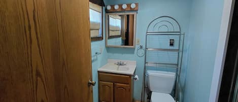 Shower, towels, soap, toilet paper