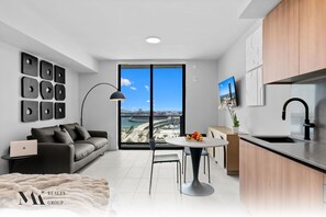 TV, offices - 501 First|Studio w/ Water View near Kaseya Center (Miami)