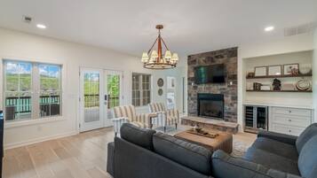Smart TV, fireplace, books