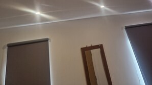 A ceiling with recessed lighting and a mirror. - Two rooms in a very quiet and clean environment. Central to getting services (Southampton)