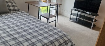 Two rooms in a very quiet and clean environment. Central to getting services