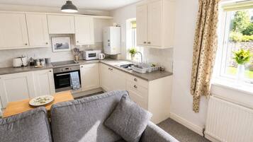 Fridge, microwave, oven, cookware/dishes/utensils