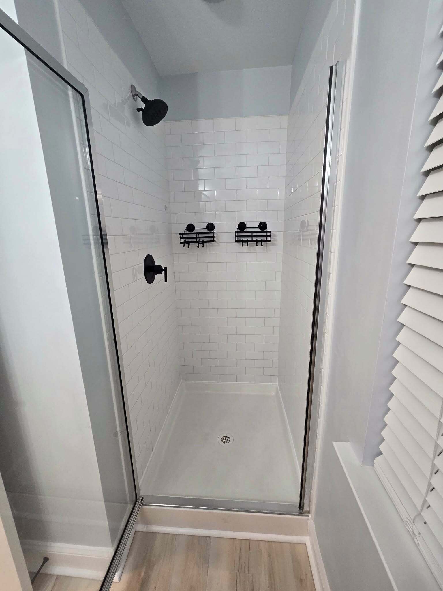 Shower, hair dryer, towels, toilet paper