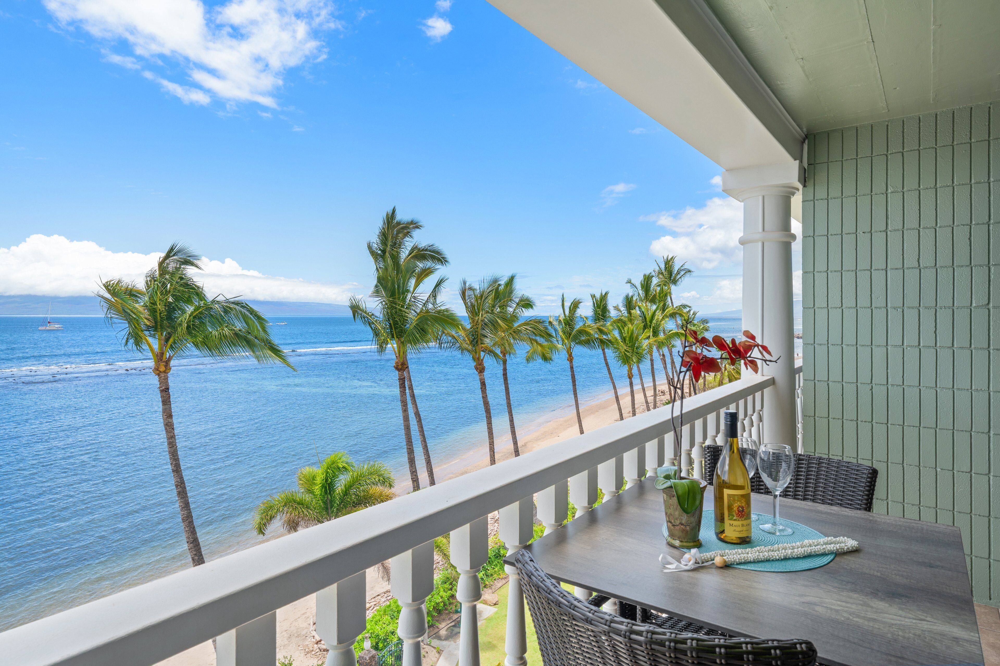 Enjoy breathtaking panoramic views of the Pacific Ocean and swaying palm trees from your private, high-floor lanai.