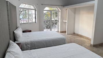 Habitación doble familiar, aire acondicionado, vista al patio | Wifi gratis