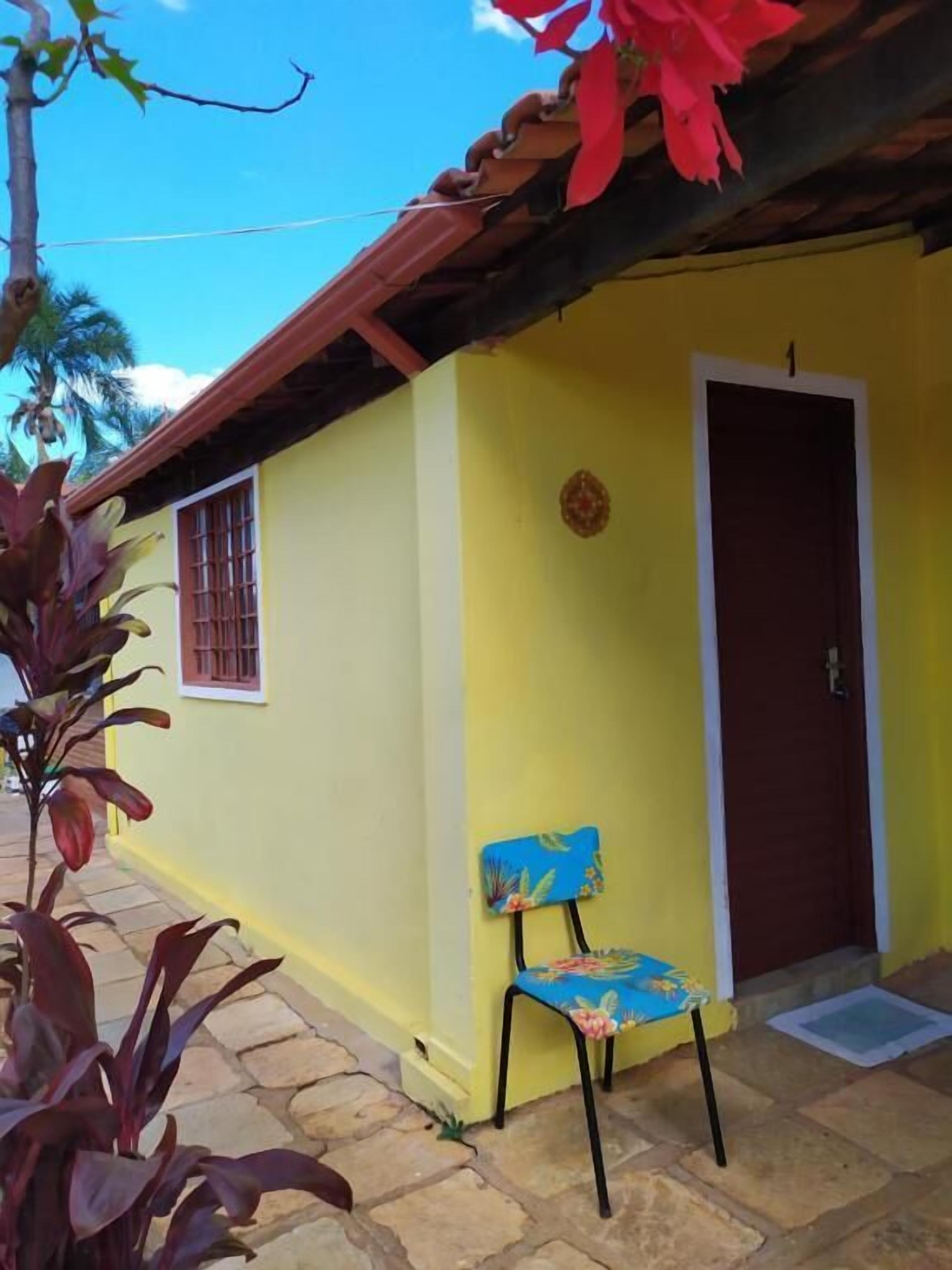 Quarto quádruplo, ar-condicionado, vista para o jardim | Fachada