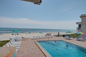 Outdoor pool - Beachfront Condo on No-Drive Beach - Ocean Views + Family Friendly (New Smyrna Beach)