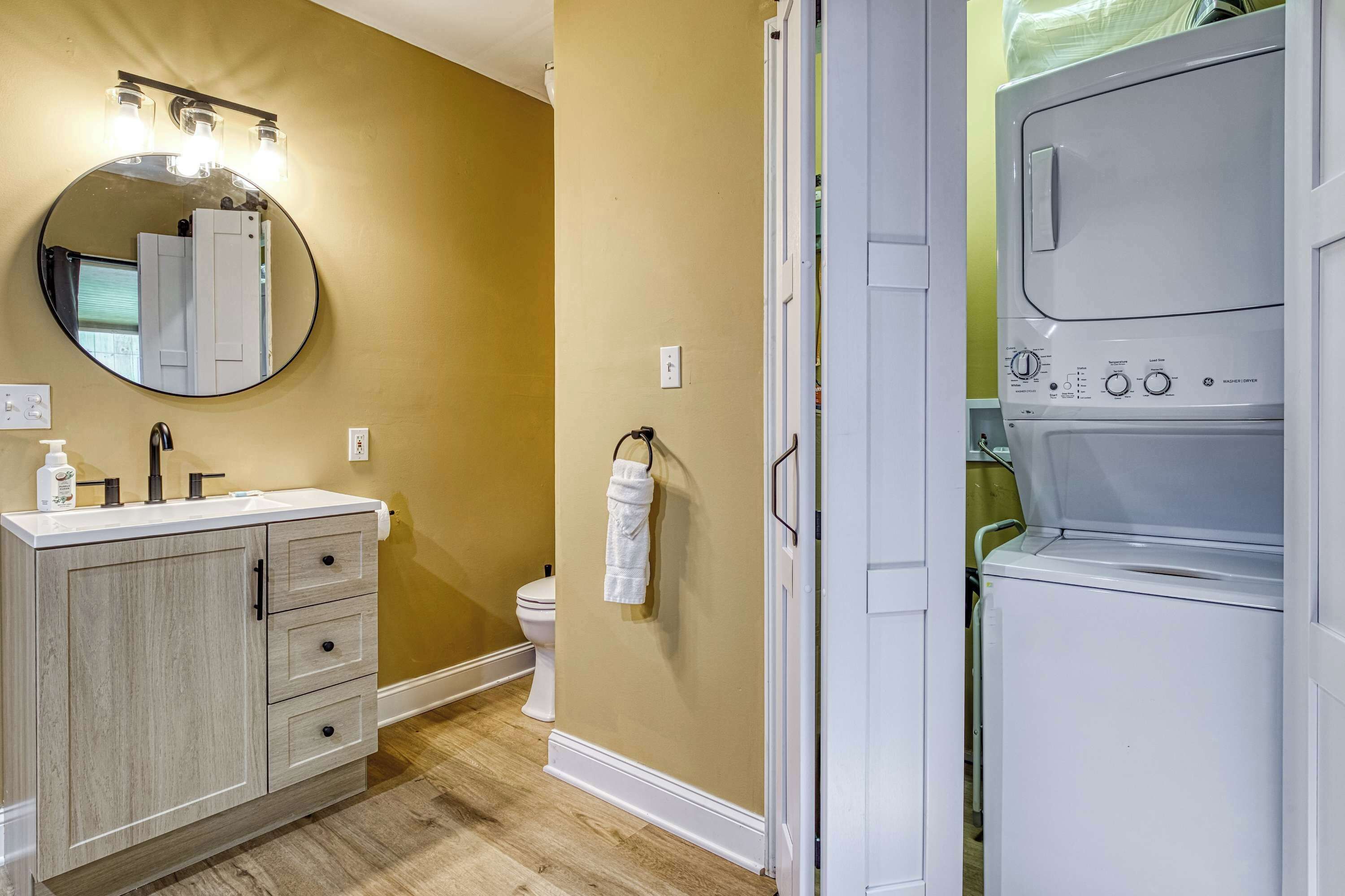 Shower, hair dryer, towels, shampoo