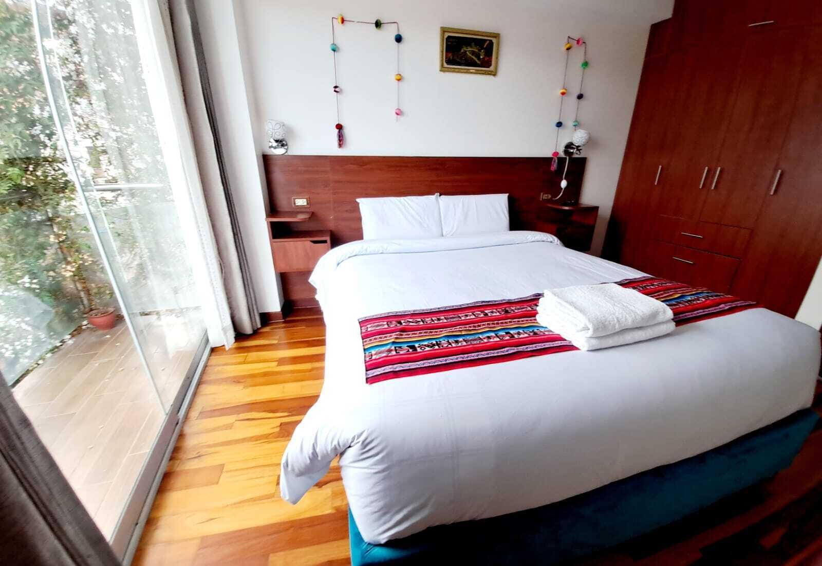 Family Apartment, Balcony, City View | Blackout drapes, iron/ironing board, free WiFi