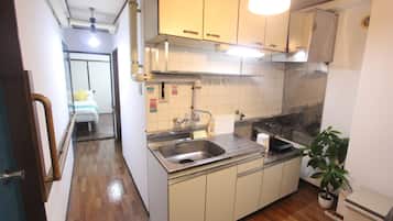 Fridge, microwave, electric kettle, dining tables