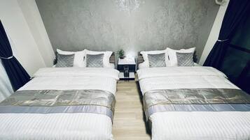 3 habitaciones, tabla de planchar con plancha, wifi y ropa de cama