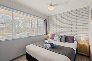 Basic Room, 2 Bedrooms, Non Smoking, Pool View | Free WiFi, bed sheets