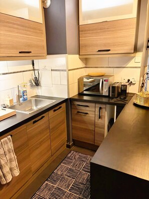 Private kitchen - Charming Parisian Duplex in the Vibrant 19th Arrondissement (Paris)