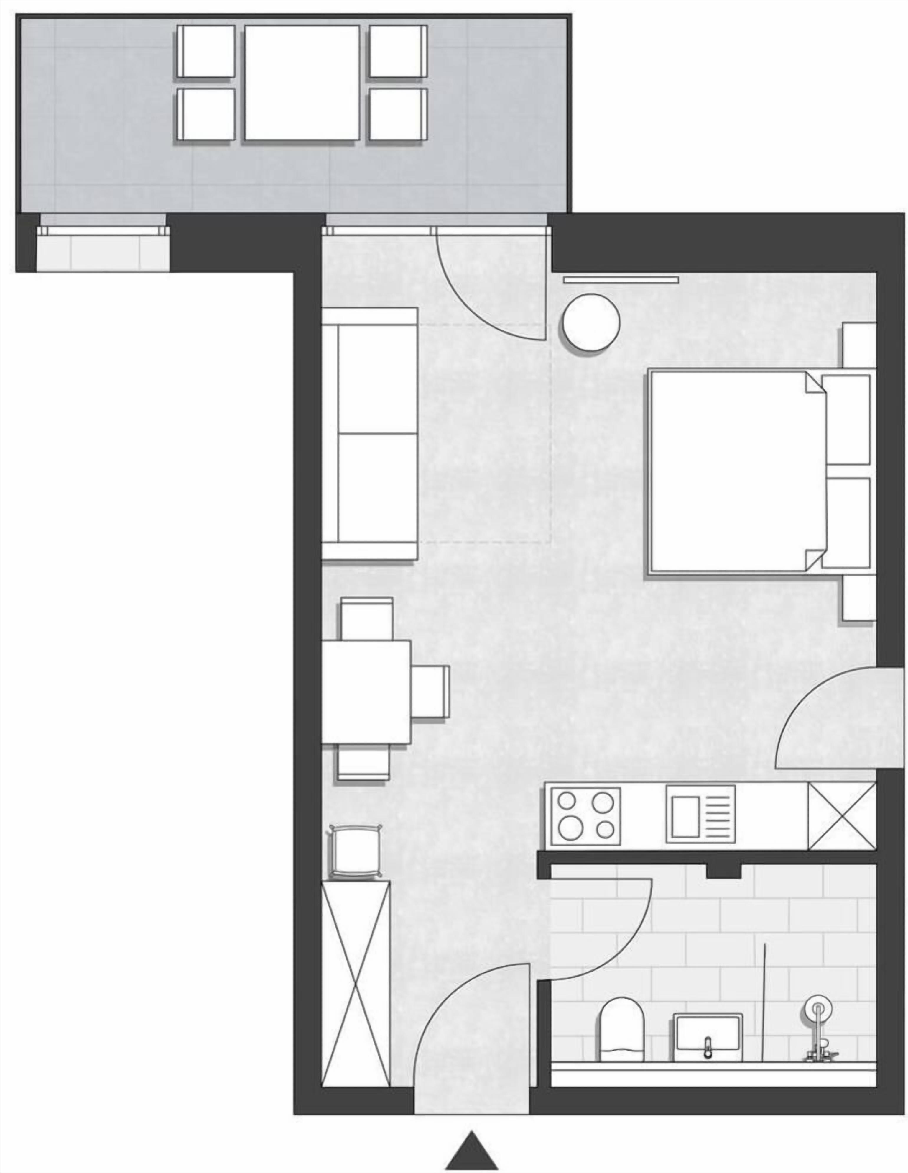 A floor plan of a hotel room with a kitchen area, a dining table, and a separate bathroom.