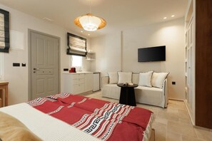 Suíte estúdio júnior, sacada, vista para o mar | Lençóis italianos Frette, roupas de cama premium