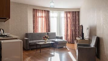 Suite Supérieure, vue ville | Coin séjour