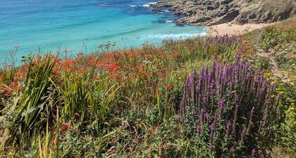 A stones throw from Mounts Bay, sweeping Hogus beach and St Michael’s Mount.