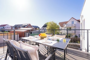 Outdoor dining - Sandpiper 1.4. Balcony. Sauna. close to the beach (Kellenhusen)