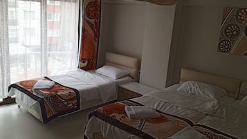 Standard Triple Room | Minibar, in-room safe, free WiFi, bed sheets