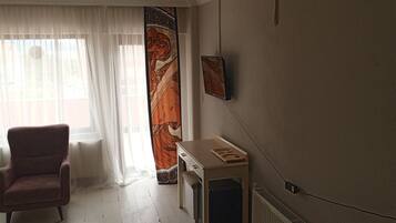 Family Quadruple Room | Living area