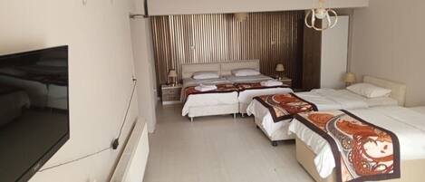 Family Quadruple Room | Minibar, in-room safe, free WiFi, bed sheets