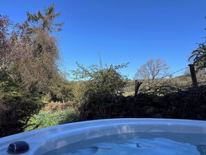 Outdoor spa tub - The Nook: Boutique Lake District Cottage with Hot Tub, Log Burner and Views (Embleton)