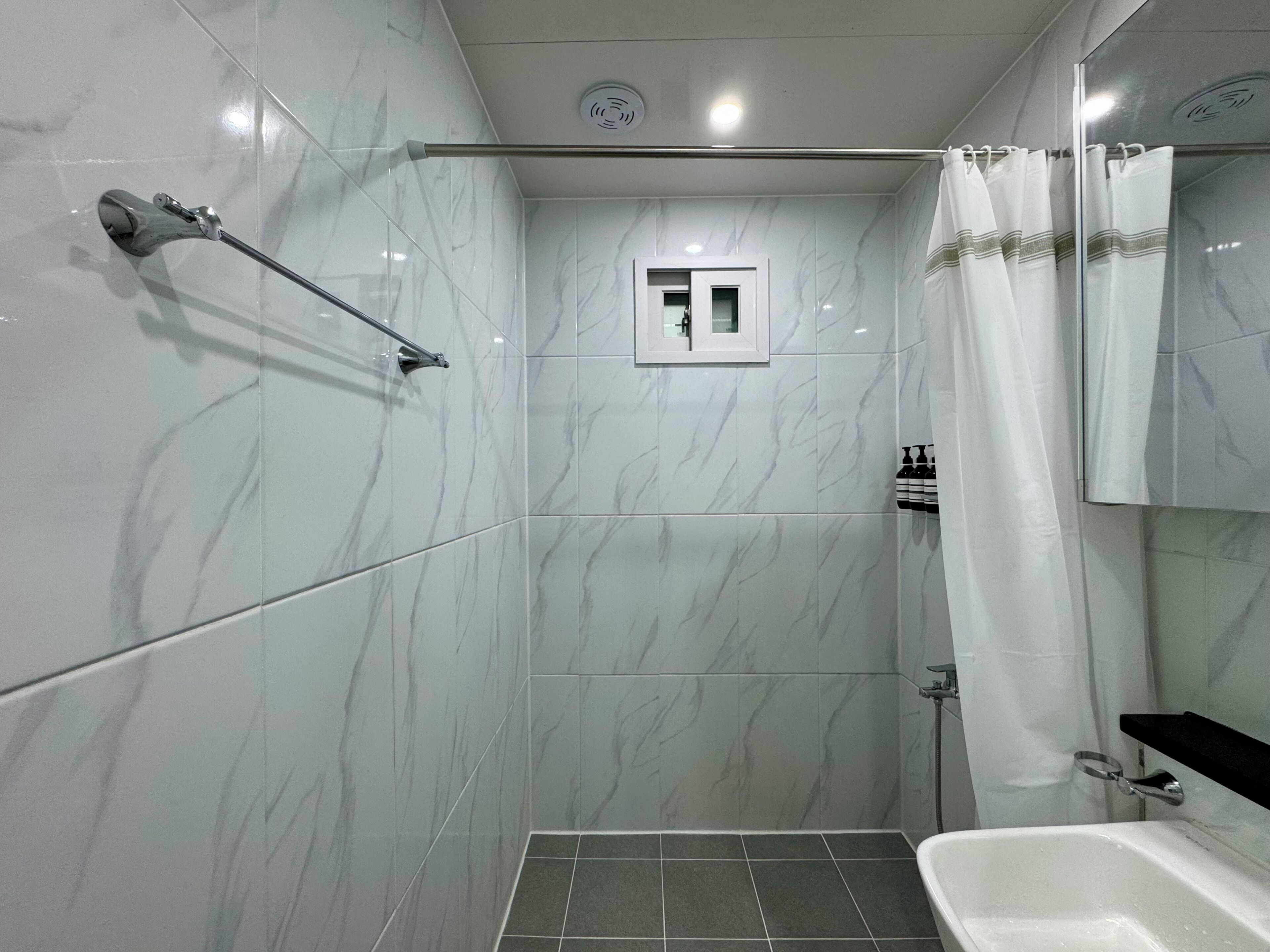 Hair dryer, towels, soap, toilet paper