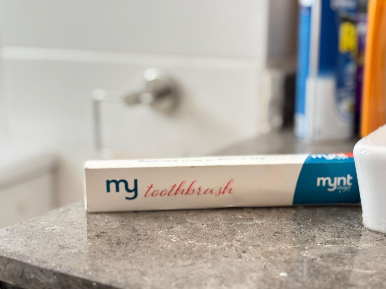 A toothbrush box labeled 'my toothbrush' on a countertop.