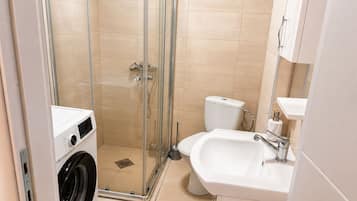 Hair dryer, towels, soap, toilet paper