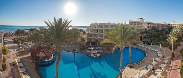 2 outdoor pools, pool umbrellas, pool loungers