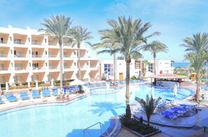 Double or Twin Room, 1 Bedroom, Balcony, Partial Sea View | Pool | 2 outdoor pools, pool umbrellas, pool loungers