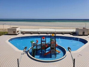 Outdoor pool, free cabanas, pool umbrellas