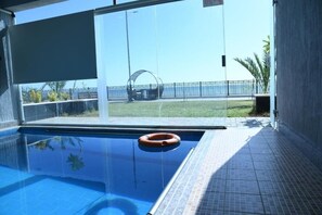 Family Studio | Pool | Outdoor pool, free pool cabanas, pool umbrellas