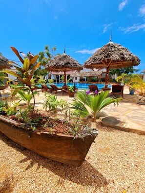 Outdoor pool, pool umbrellas, pool loungers