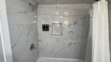 Hair dryer, towels, soap, toilet paper