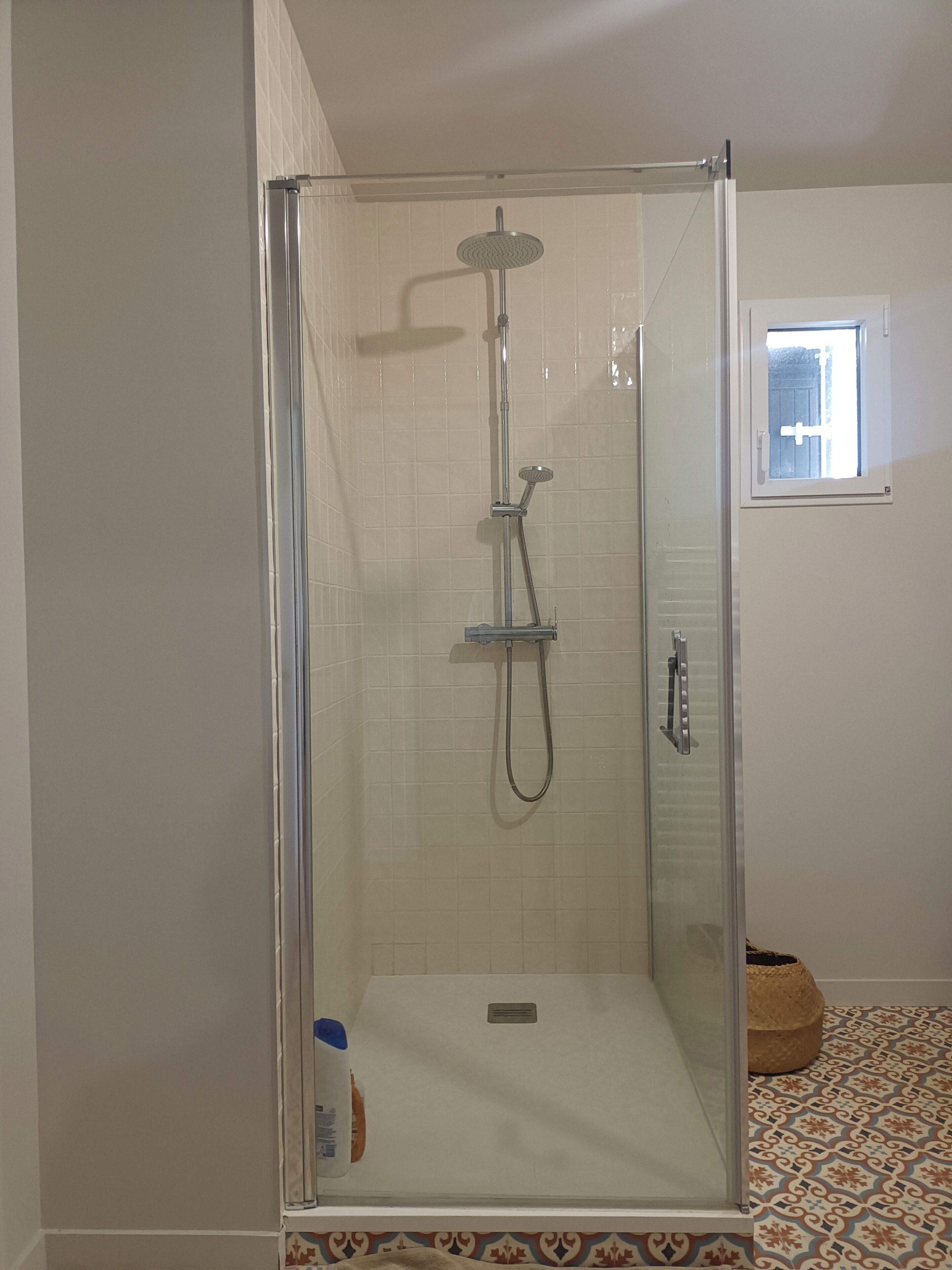 Shower, hair dryer, towels, soap