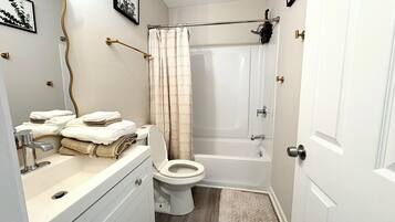 Hair dryer, towels, soap, toilet paper