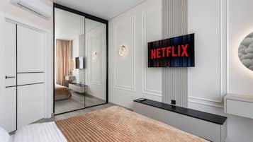 Luxury Apartment, Balcony, Courtyard View | Blackout drapes, iron/ironing board, cribs/infant beds, free WiFi