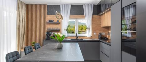 Coffee/tea maker, fridge, microwave, oven