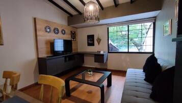 Departamento superior, patio | Área de sala de estar