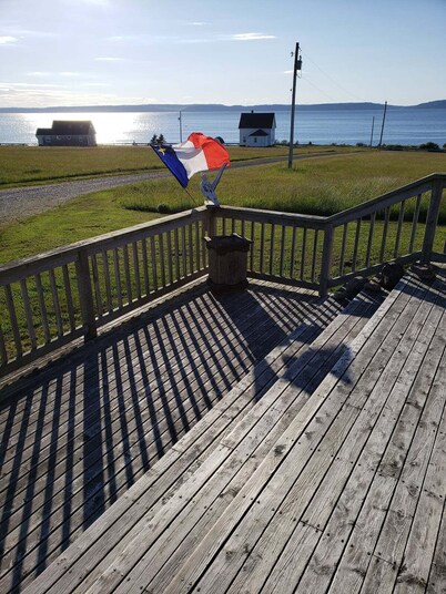 Ocean View and Sunset, Log House